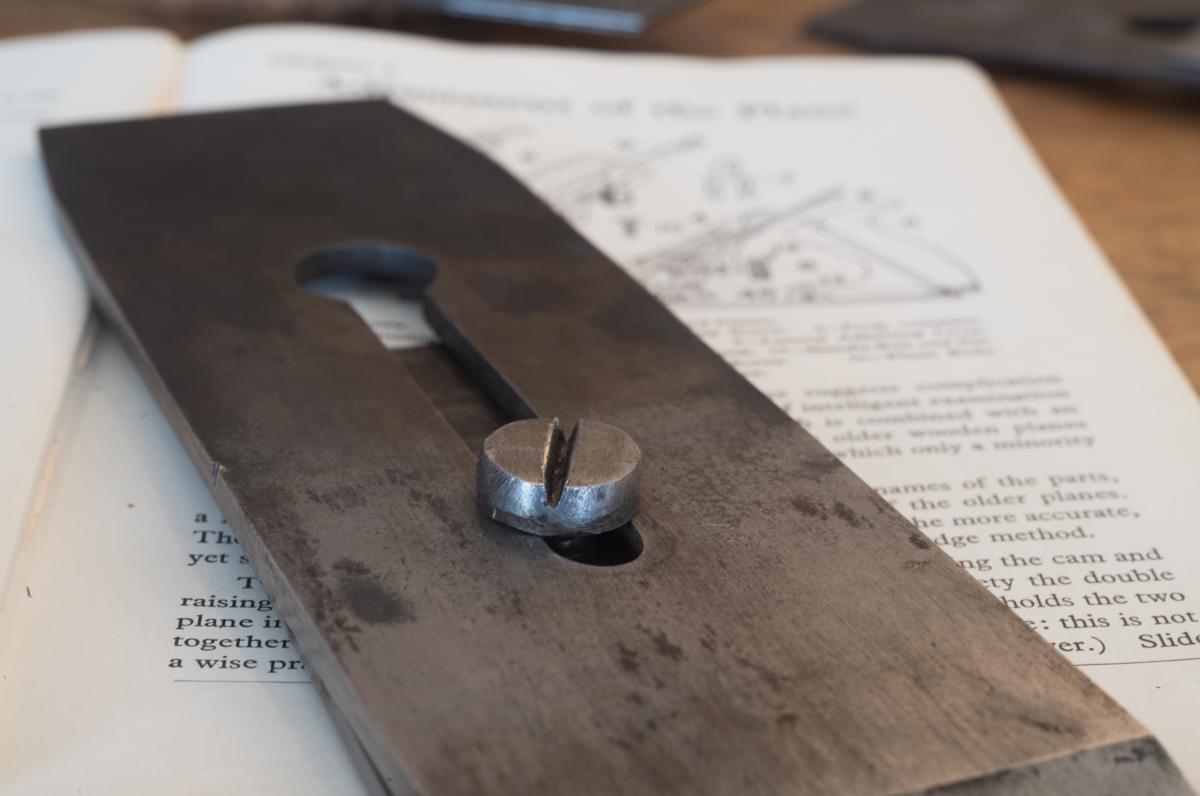 Hand filed cap iron screw