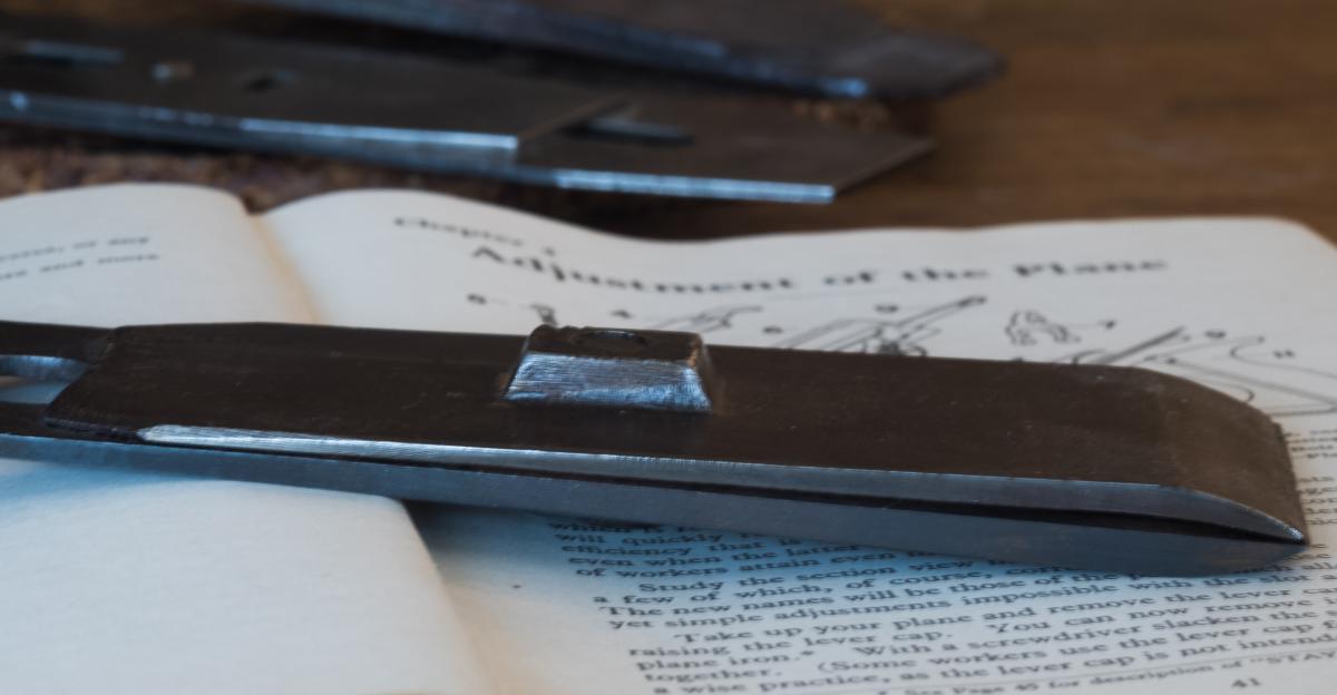 This Mathieson cap iron was forged from solid. The cap iron is tapered and the boss for the screw is integral with the rest of the body.