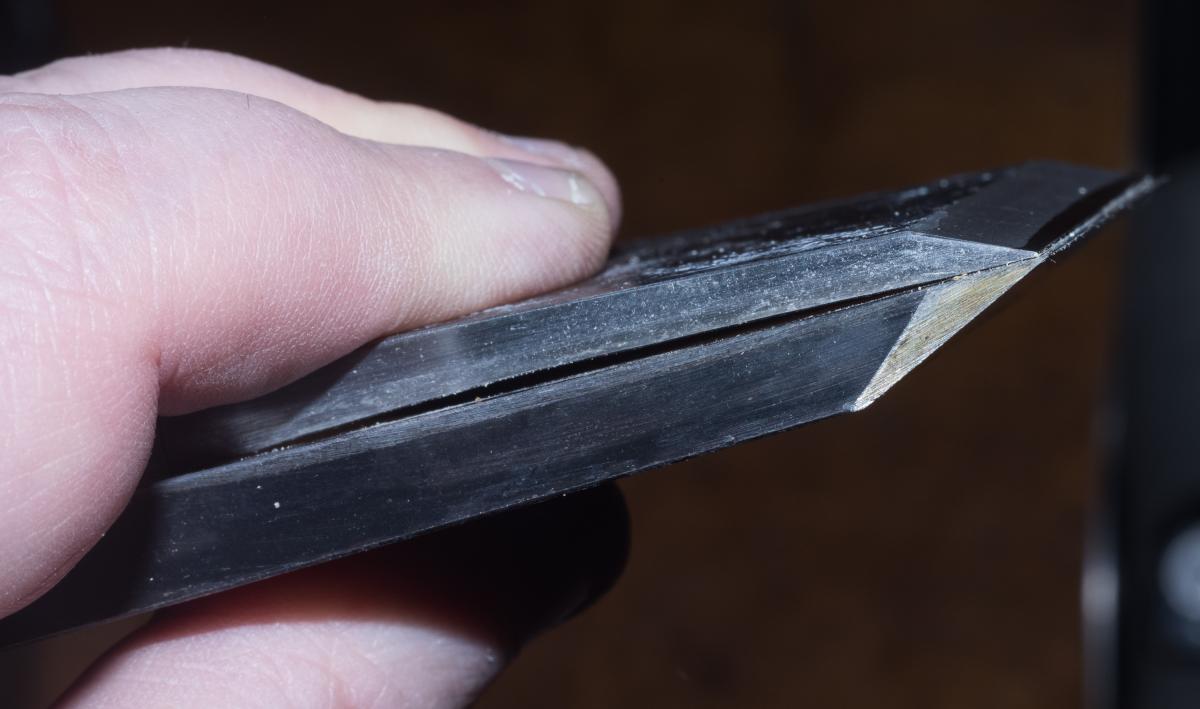 Modern Japanese planes use cap irons which are made and ground like a dull plane iron. 