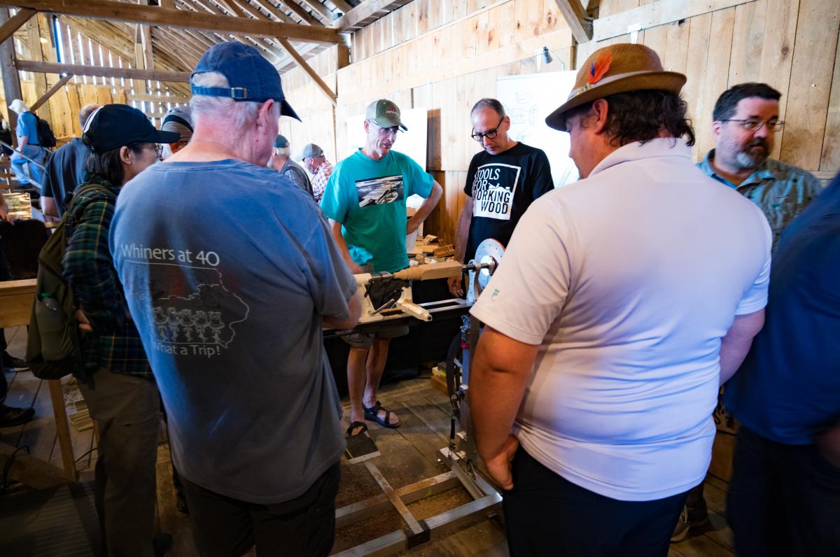 Alan Dorsey explaining what's going on with the treadle lathe