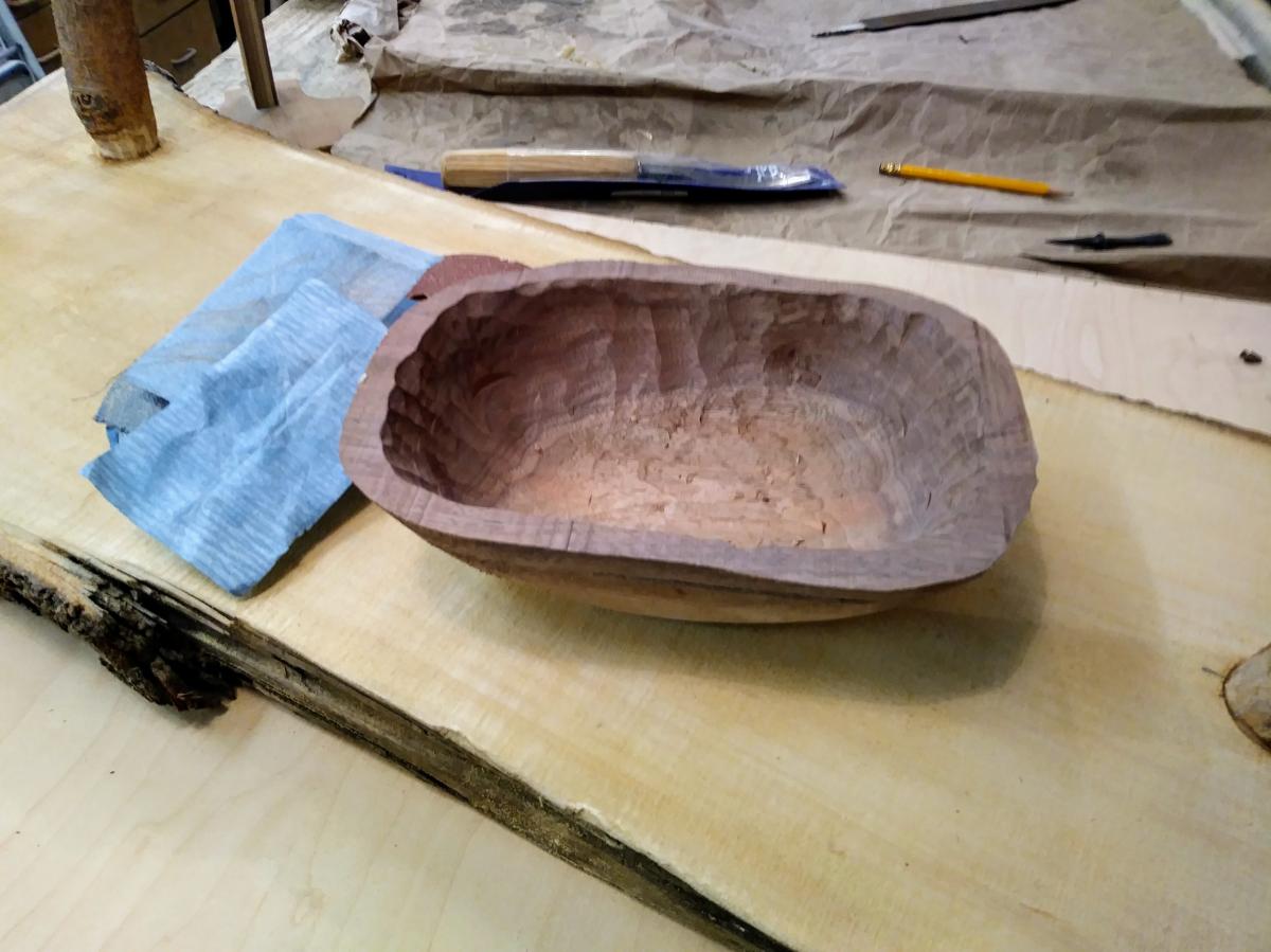 The walnut bowl in the pictures above was created by one of my students. Ideally&comma; more time should have been spent in refining both the exterior and the interior of the bowl before removing the clamping block from the top of the bowl to the keel&comma; and then before sawing off the keel. As a result of time constraints this bowl will look more rustic&comma; showing gouge marks in the inside.