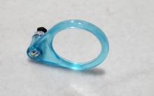 The OptiLoupe adds 2 1/2 x magnification to either eye of any OptiVisor. Just simply remove the OptiVisor's lens plate fastener and install the OptiLoupe next to the lens plate.